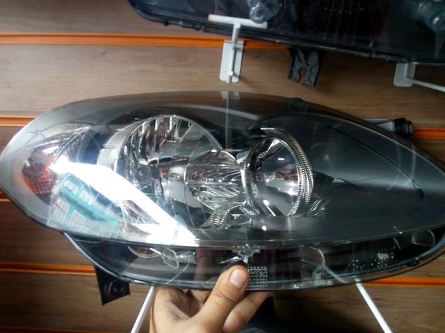 Farol Palio Attractive/Sporting Lado D. (Genuínos Fiat)