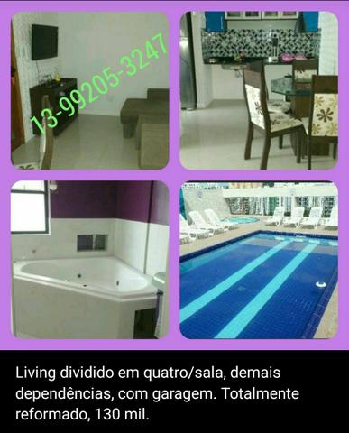Sala living dividido no centro de SV