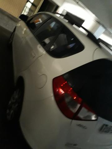 AUTO 7 lugares IMPECÁVEL