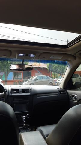 Fusion 2011 motor 2.5 com teto solar com 58.700 km rodados - Foto 11