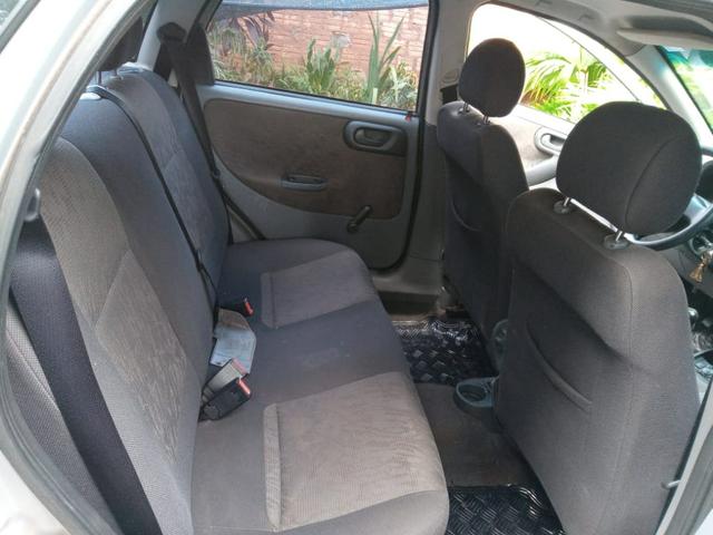 Vendo corsa sedan 1.0 completo - Foto 5