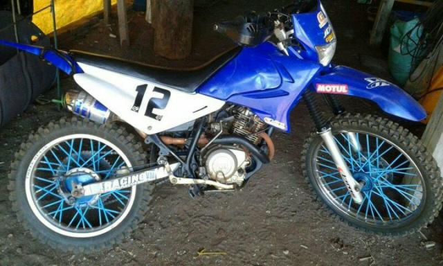Vendo moto pra roça nao ten placa esta com peneu comun