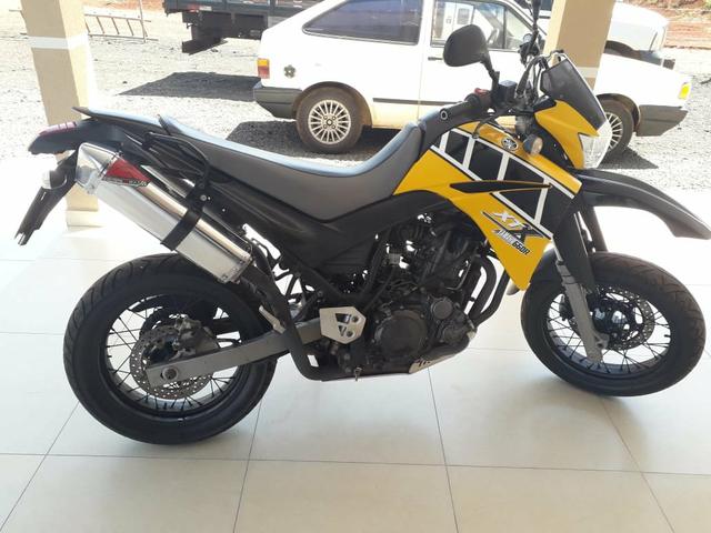 Vendo ou troco escape Coyote trs 2 way por Original xt 660 - Foto 2