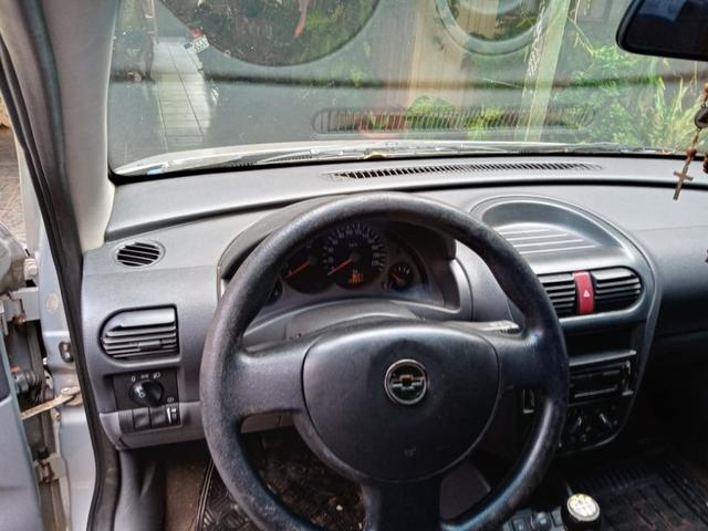 Vendo corsa sedan 1.0 completo - Foto 3