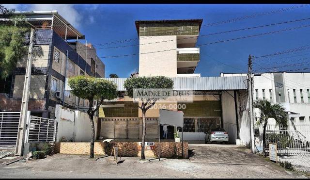 Predio comercial com loja e 2 apartamentos . corredor comercial total de 552m2