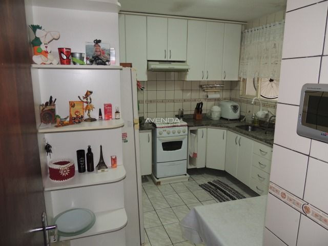 Casa térrea em ótima localização, contendo 3 dormitórios sendo 01 suíte - Foto 19