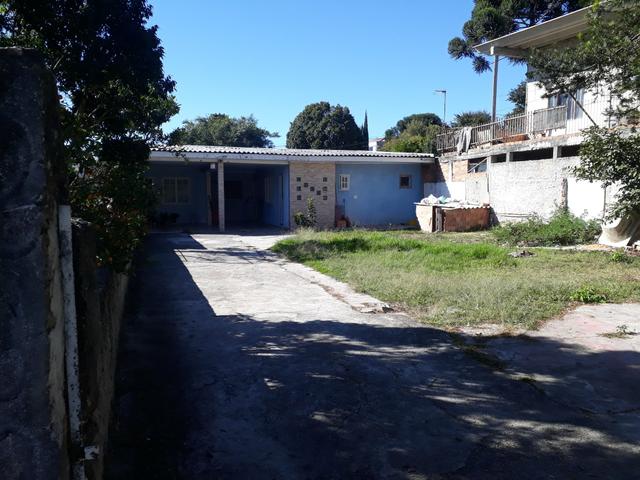 Terreno com Casa em Curitiba