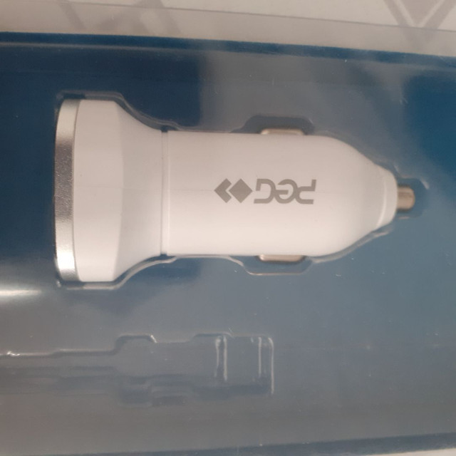 Fonte carregador veícular.  Com 2 entradas usb.  Novo.
