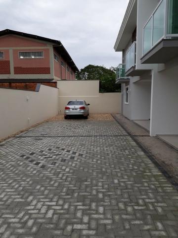 Sobrado com 3 suites 570.000 no Costa e silva