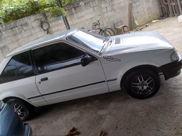 Vendo ou troco num carro mais novo gol,uno,palio.etc - Foto 7
