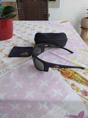 Vendo lindo oculos de sol Mormaii Acqua produto novo e original completo - Foto 6