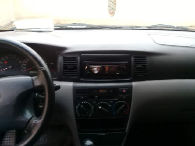 Corolla 2004 completo.