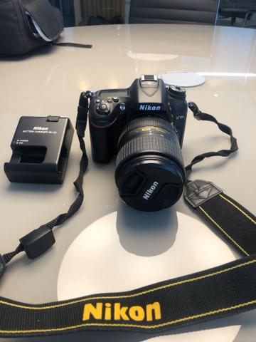 Nikon D7100 + Lente Nikor 18-300 + adaptador Wi-Fi + Carregador + Mochila