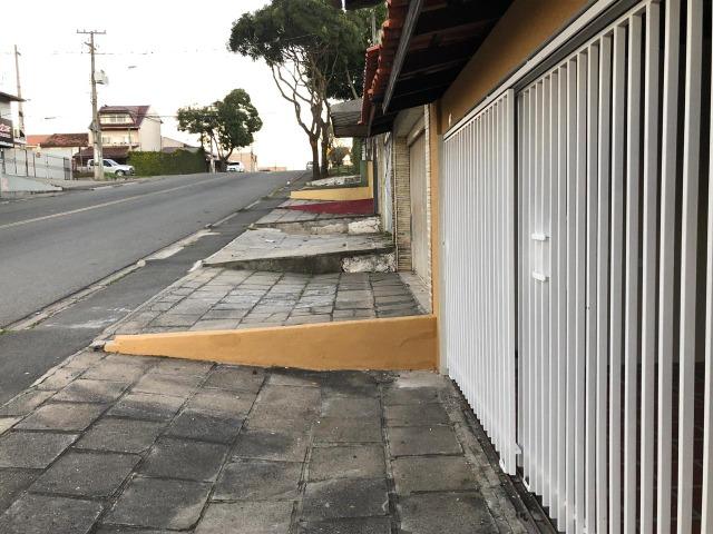 Sobrado: 3 quartos, ampla sacada e garagem coberta para 2 carros - Foto 13