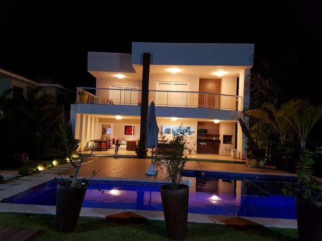 Casa em Guarajuba com 5/4 e 500m² no Cond. Paraiso dos Lagos!