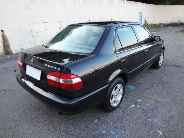 Toyota corolla xei 1.8 automático preto completo com gnv - Foto 2