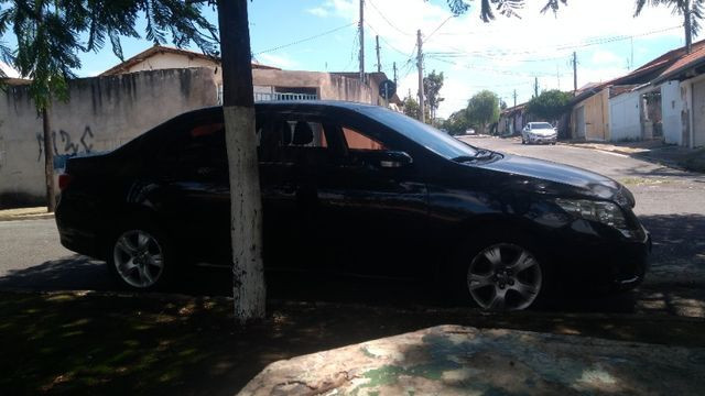 Vendo Corolla preto completo