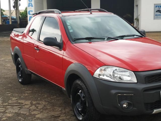 Strada 1.4 com 3 portas, veículo top
