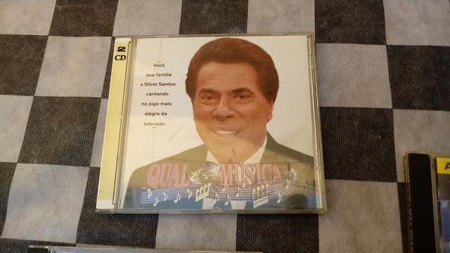 Cd duplo Silvio Santos - Qual é a Música (Jogo PC Interativo + Volume 1)