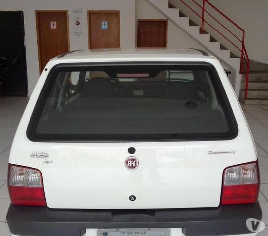 Porta /Tampa Traseira (Mala) p/ Fiat Uno Fire a partir de 2004 / Original - Foto 2