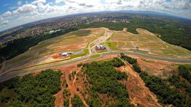 Terreno Florais Itália com 458,79m² Jardim Itália condomínio fechado - Foto 15