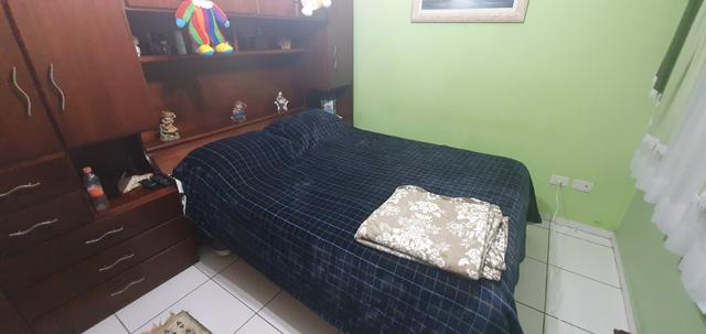 Quarto em casa de família