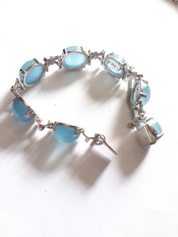 Pulseira em ouro branco com pedra de água marinha. 