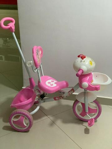 Triciclo empurrador Infantil