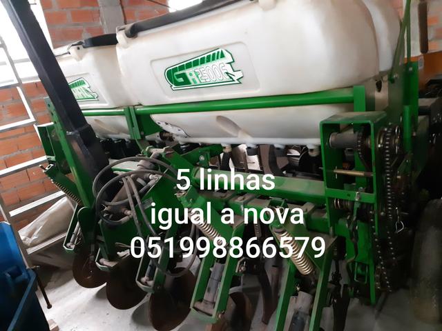 Plantadeira 5 linhas semi nova - Foto 3