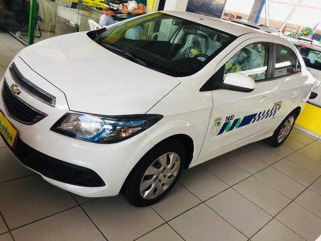 Prisma 1.4 lt 2016 gnv Tx já com a praça