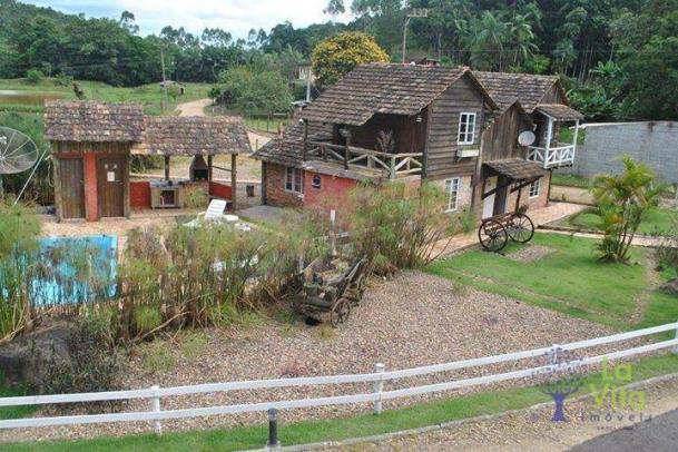 Sítio com 8 dormitórios para venda e locação, 29434 m² por R$ 1.040.000 - Zona Rural - Rod