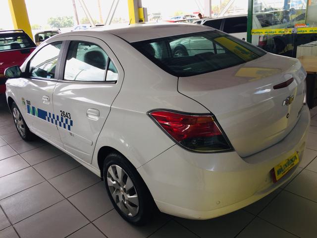 Prisma 1.4 lt 2016 gnv Tx já com a praça - Foto 4