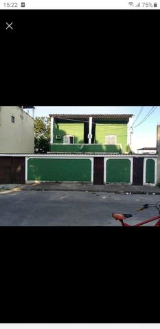 Vendo terreno com 5 casas