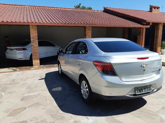 Prisma LTZ 1.4 único dono 2015 IPVA pago leiam descrição - Foto 11