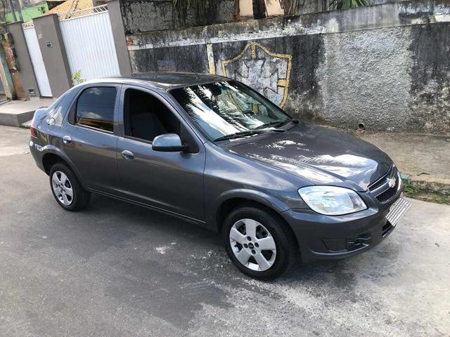 Prisma 1.4 completo de tudo - Foto 4