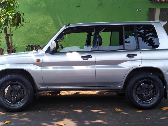 Mitsubishi Pajero iO 1.8 - ano 2001 Leia o anuncio - Foto 6