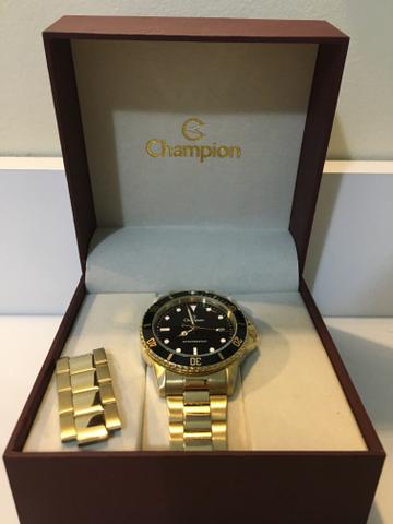 Relógio champion dourado