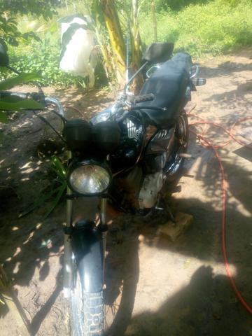 Moto de leilão com nota de leilão