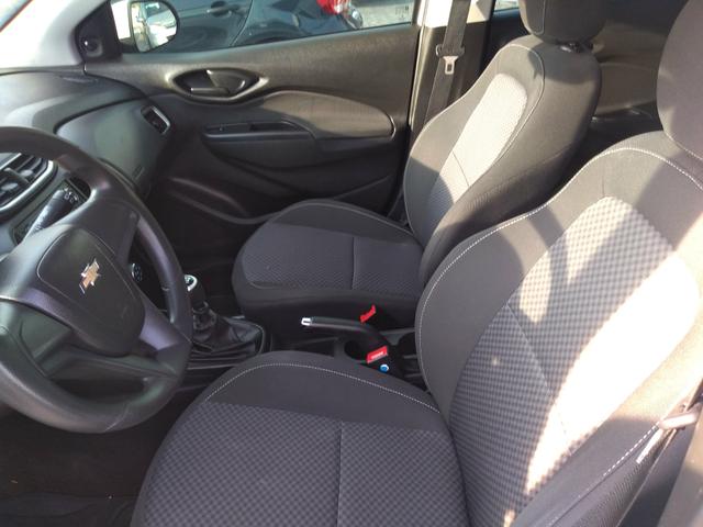 Onix LT completo abaixo tabela pneus okm air bag abs revisado garantia - Foto 2