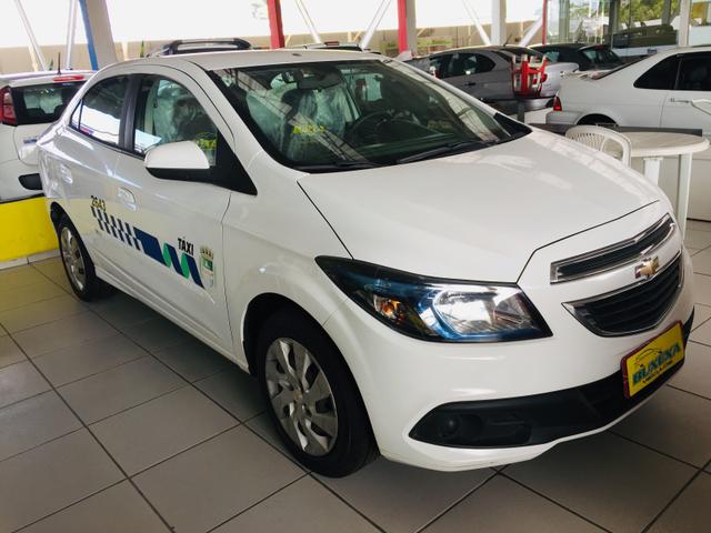 Prisma 1.4 lt 2016 gnv Tx já com a praça - Foto 2