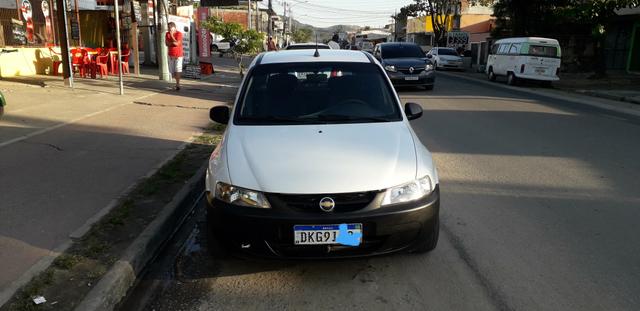 Celta 2005 Branco 4p Ar Vidro Trava Pneus - Foto 5