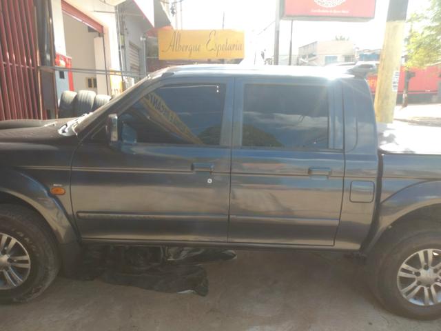Vende-se l200 com tudo pago, abaixo da tabela fip, em boas condições, só pegar e andar! - Foto 6