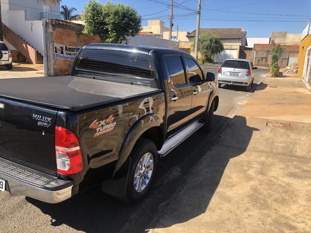 Vendo Hilux 3.0 srv top 2014 - Foto 5