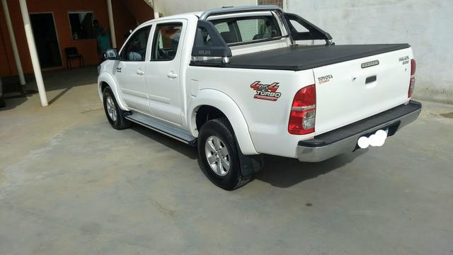 Hilux SRV automática. Troco por Sw4 - Foto 3