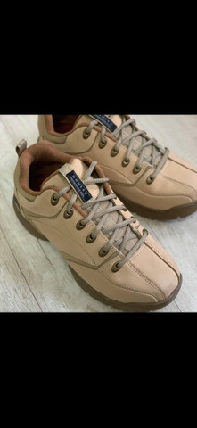 botinha da oakley refletiva