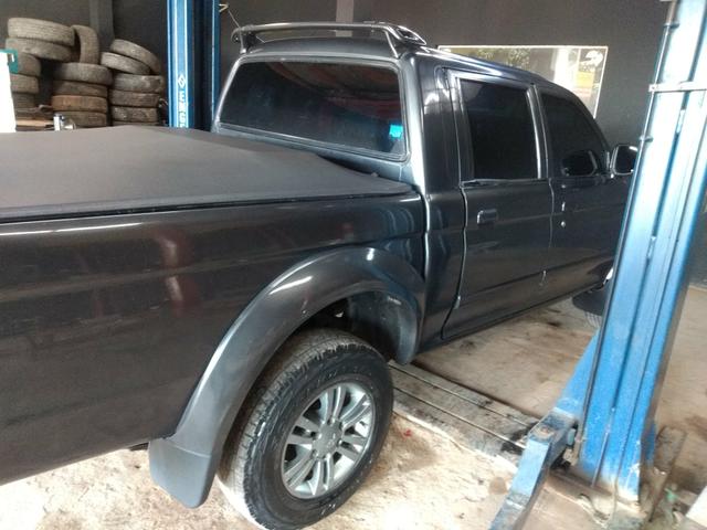 Vende-se l200 com tudo pago, abaixo da tabela fip, em boas condições, só pegar e andar! - Foto 5
