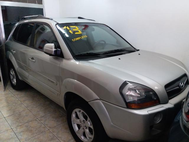 Hyndai Tucson Top autom. noiva troco e financio aceito carro ou moto maior ou menor valor - Foto 6