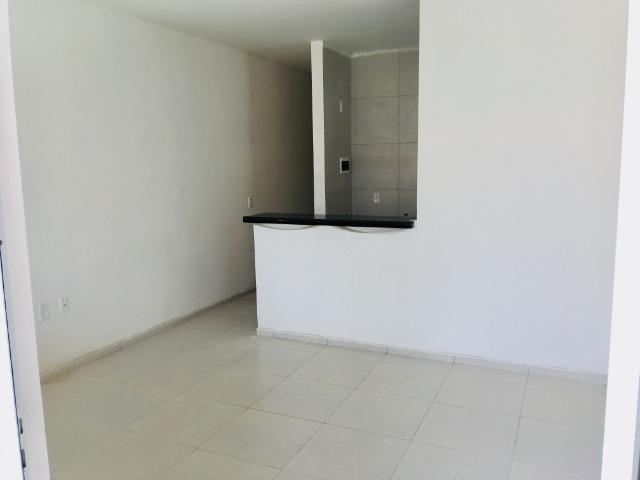 Documentação Inclusa: 2 quartos, 2 wcs, garagem, sala, coz americana, quintal, área serviç - Foto 7