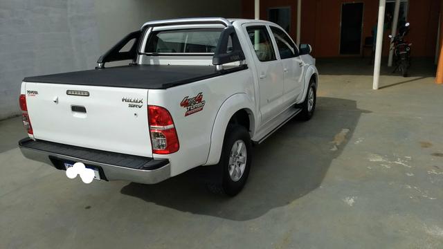 Hilux SRV automática. Troco por Sw4 - Foto 2