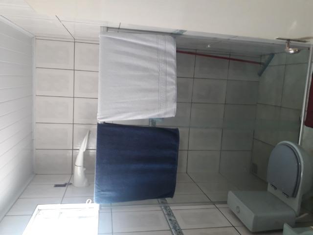 Suíte para solteiro(a) em casa ampla na zona sul, incluso água (dividir aluguel) - Foto 10